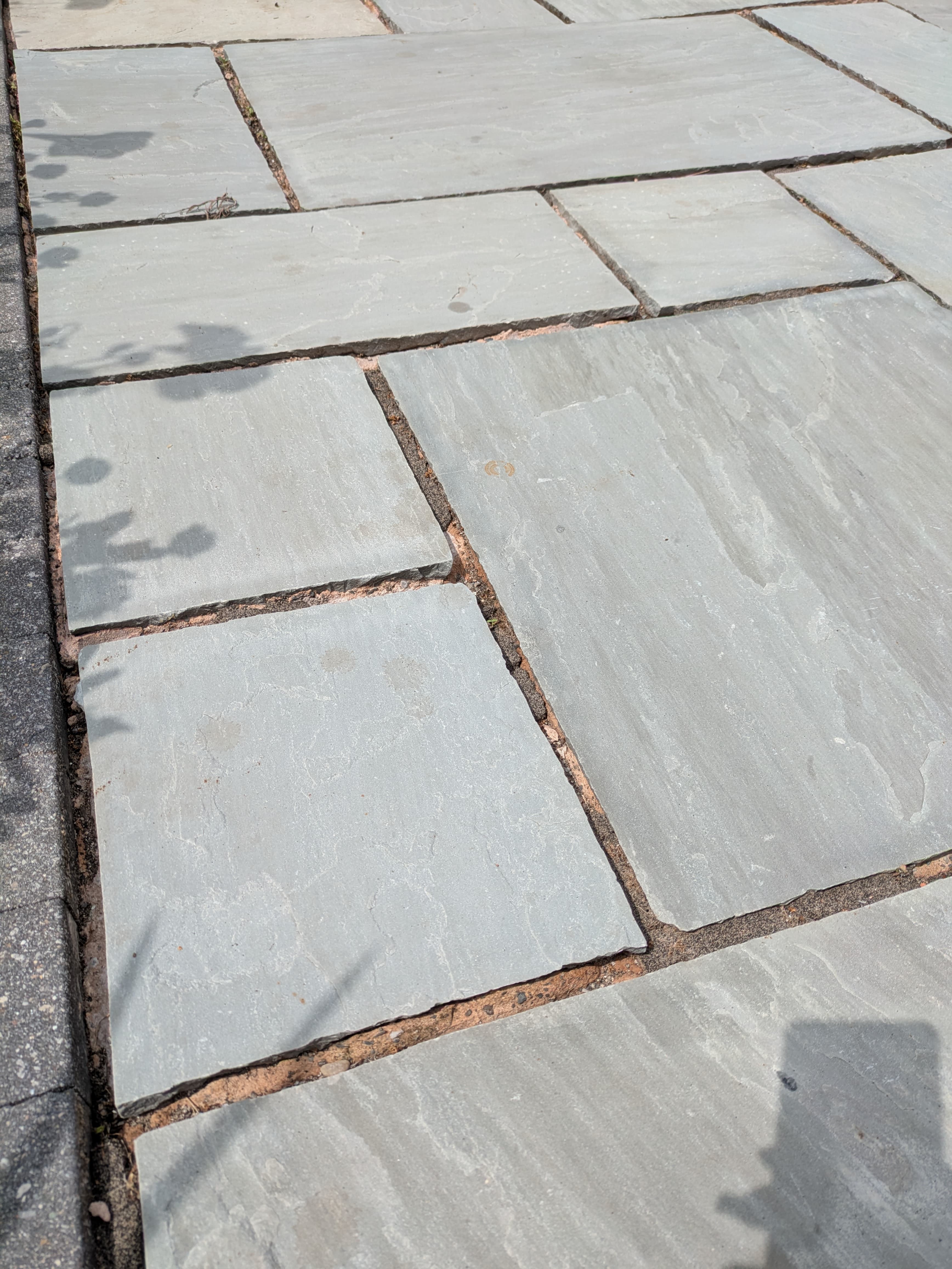 Dirty driveway before power washing